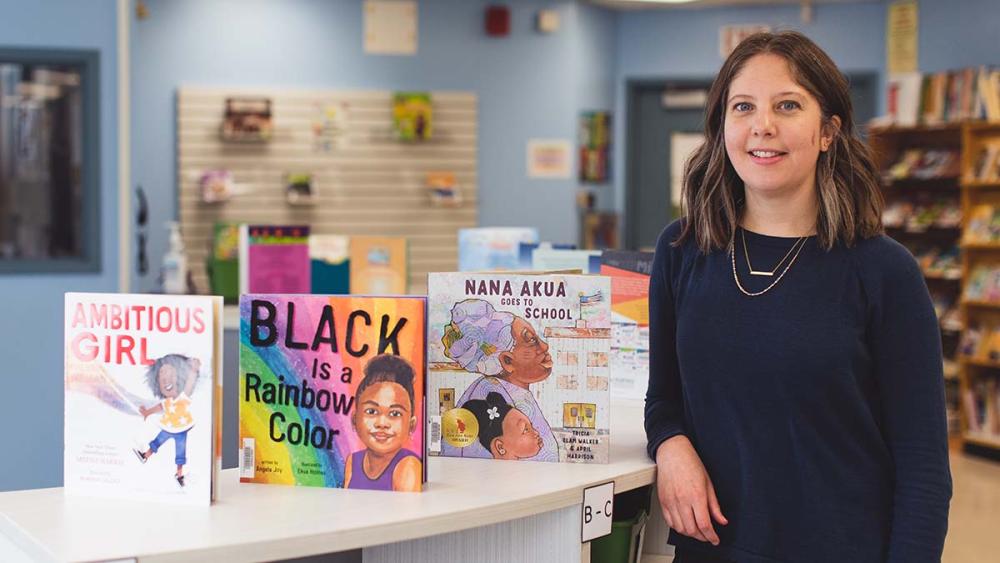 Amanda Cannon posing with children's books