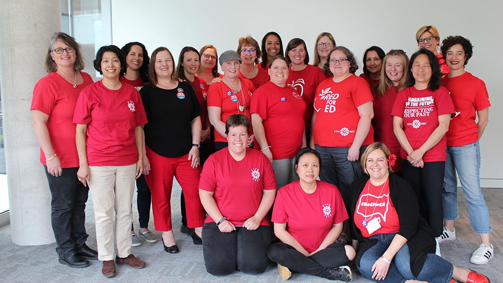Women in Action group posing together in 2026