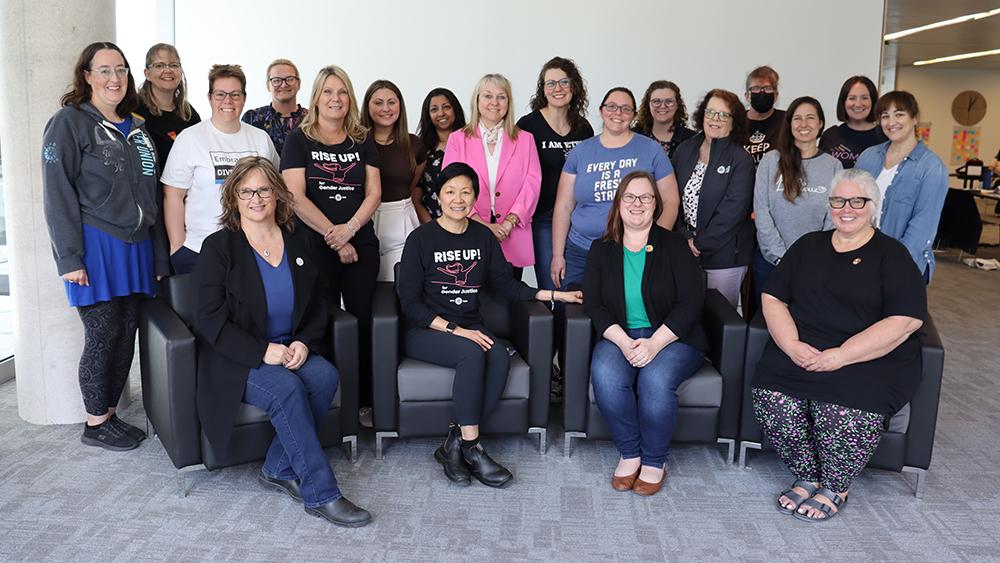Women in Action group posing together in 2024