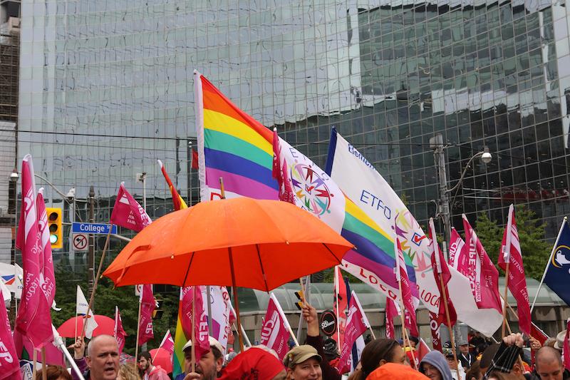 etfo members with flags gathered together at rally