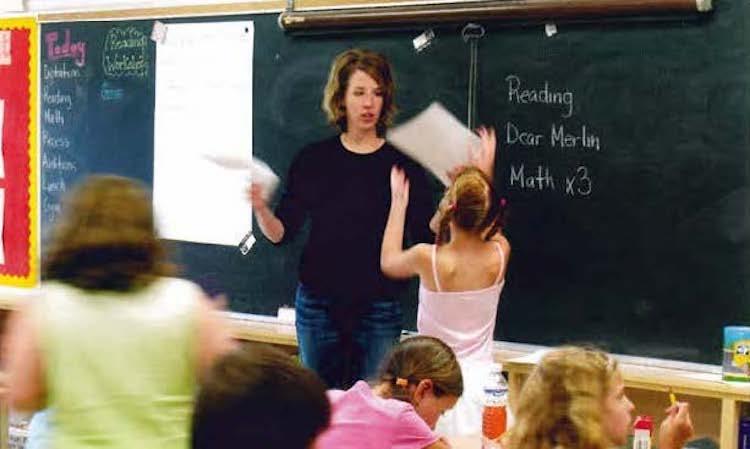 teacher at front of classroom