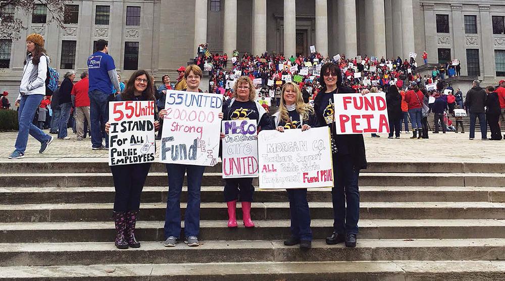 Teachers striking outside government building. Photo Courtesy of Summer McClintock