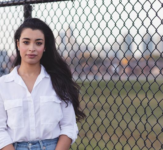 Nessrine Lara Lemqadem Alyass posing outside of school