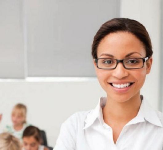 Teacher standing in front of classroom