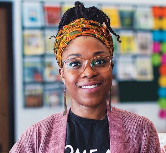 Tamla Young posing in library