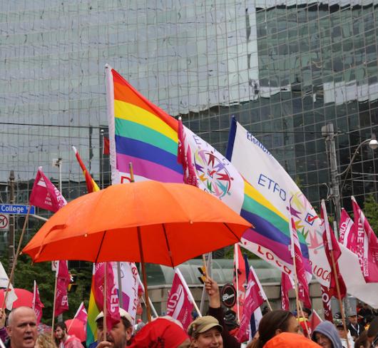 etfo members with flags gathered together at rally