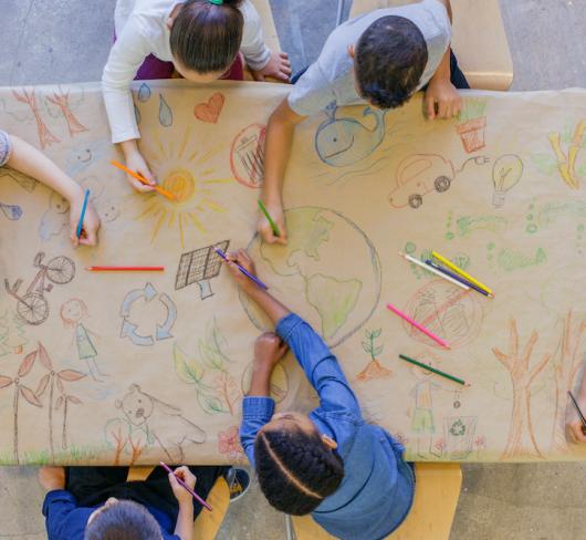 children drawing on paper