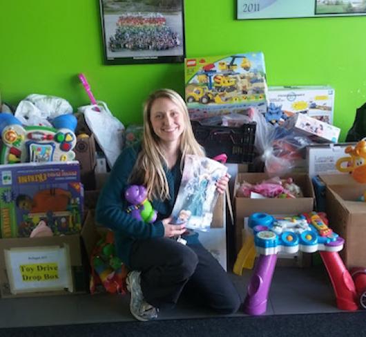 Shannon Gamble sitting in room with toys