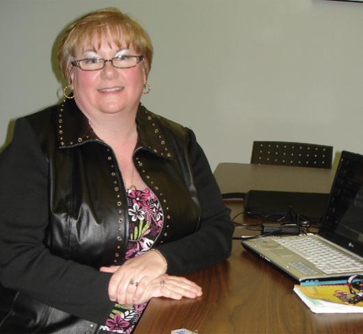 woman sitting at desk in office