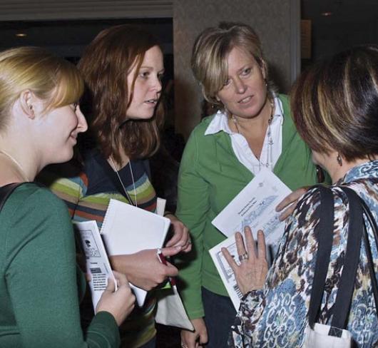 female etfo members standing together having a discussion